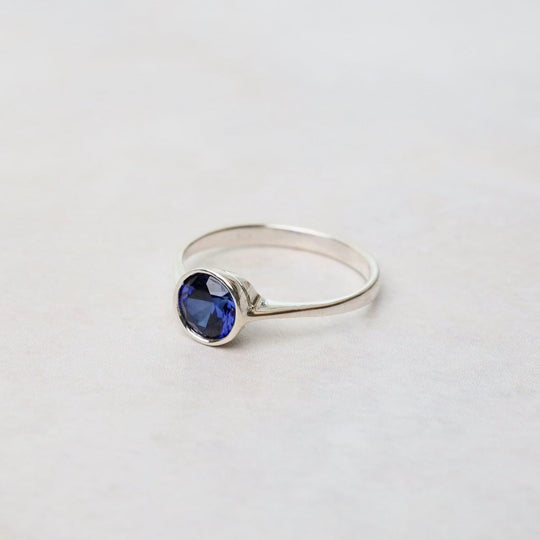 Sterling Silver Ring with 6mm Round Bezel Set Synthetic Sapphire